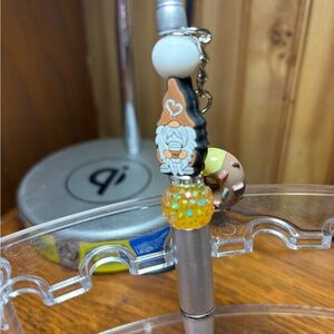 Gnome Themed Pen with Orange and White Accents